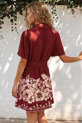 Model wearing Mikan Mini Dress in Orabella Print Wine from Salty Crush