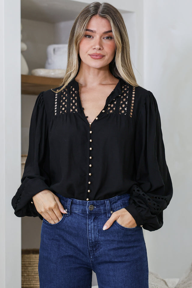 Model wearing Milano Blouse in Black from Salty Crush