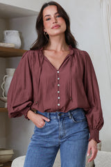 Model wearing Moree Blouse in Mulberry from Salty Crush