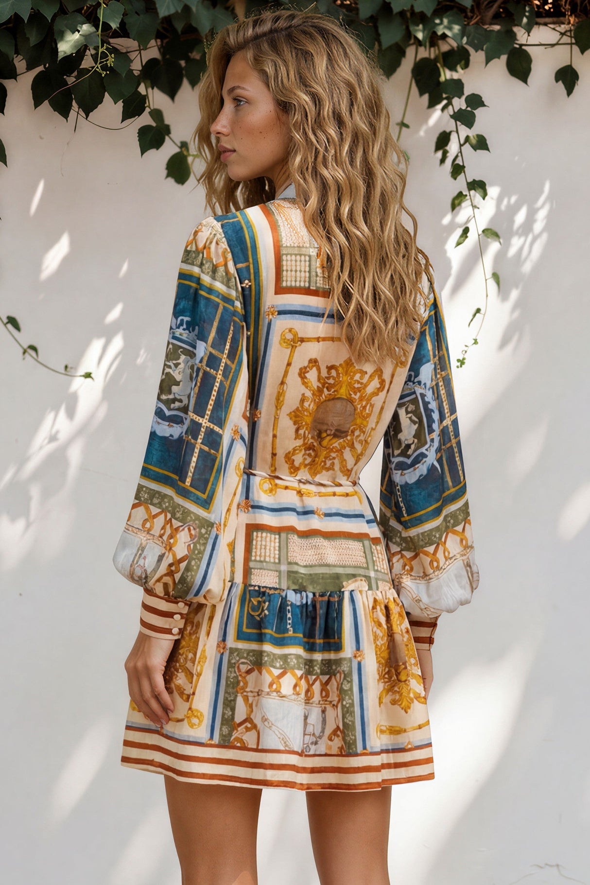 Model wearing Morso Mini Dress in Regalia Print from Salty Crush