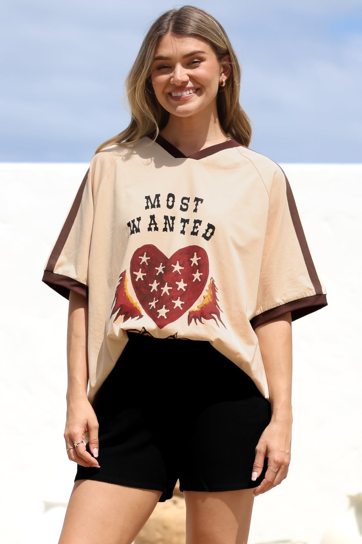 Most Wanted Tee - Graphic Print Short Sleeve T-Shirt with Racer Stripe Sleeves in Beige