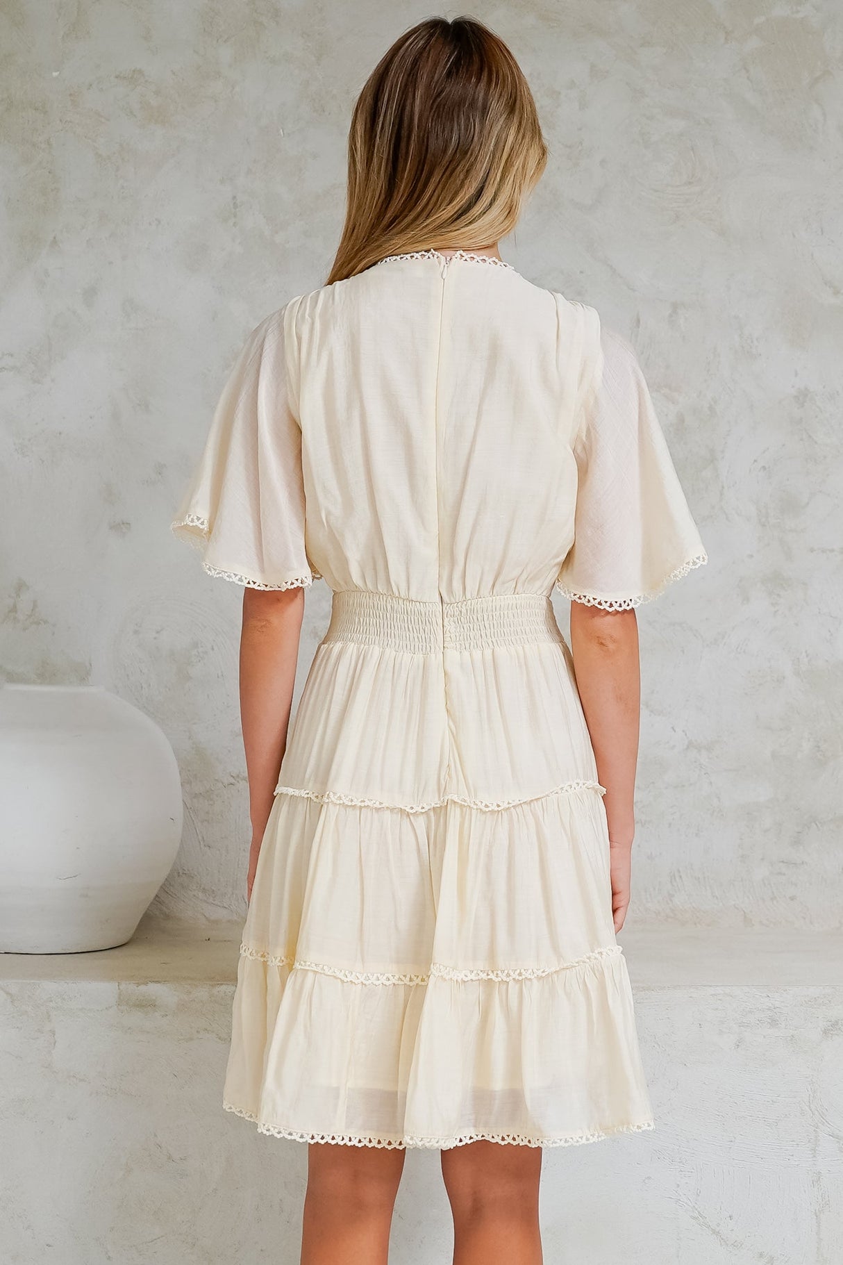 Nessie Mini Dress - Lace Trim Tiered Dress with Flutter Sleeves in Cream