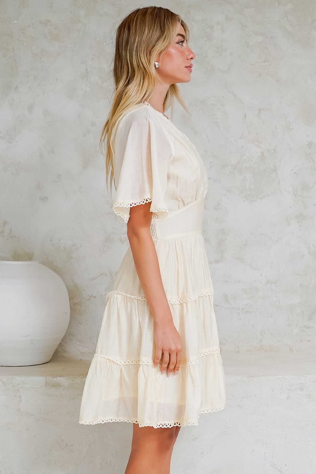 Nessie Mini Dress - Lace Trim Tiered Dress with Flutter Sleeves in Cream