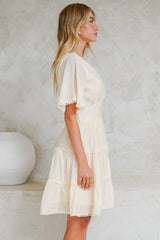 Nessie Mini Dress - Lace Trim Tiered Dress with Flutter Sleeves in Cream