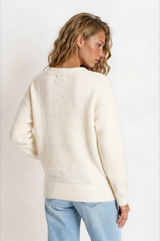 Model wearing Nikita Jumper in White from Salty Crush
