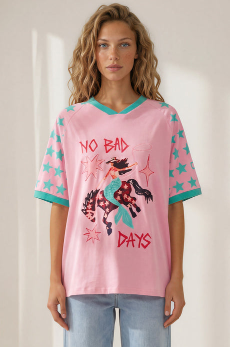 Model wearing No Bad Days Tee in Pink from Salty Crush
