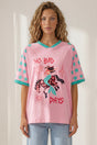 Model wearing No Bad Days Tee in Pink from Salty Crush