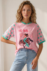 Model wearing No Bad Days Tee in Pink from Salty Crush
