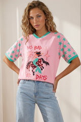 Model wearing No Bad Days Tee in Pink from Salty Crush