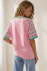 Model wearing No Bad Days Tee in Pink from Salty Crush