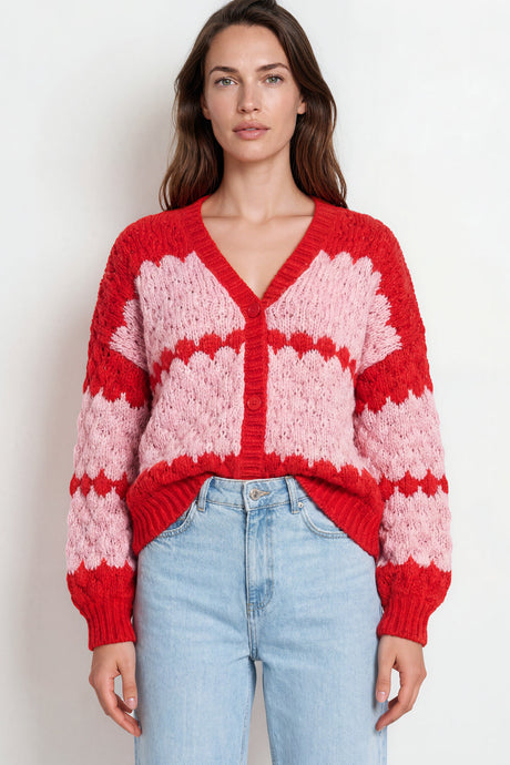 Model wearing Nolar Cardigan in Pink/Red from Salty Crush