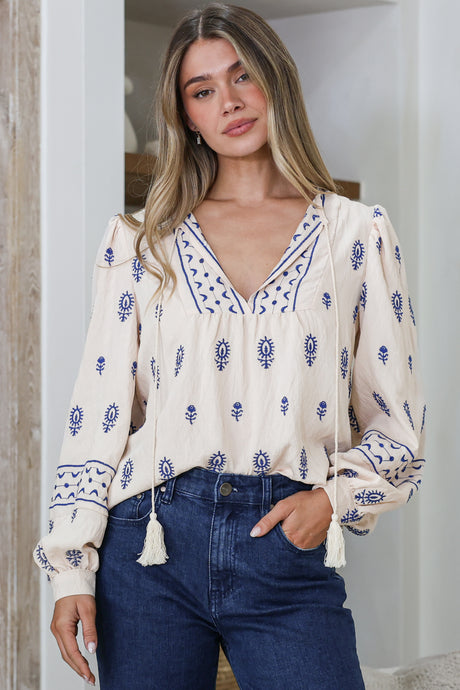 Model wearing Nouveau Top in Cream from Salty Crush