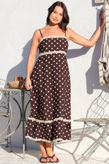 Model wearing Novalie Midi Dress in Polka Chocolate from Salty Crush