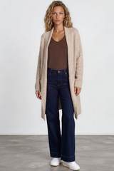 Model wearing Oswin Cardigan in Beige from Salty Crush
