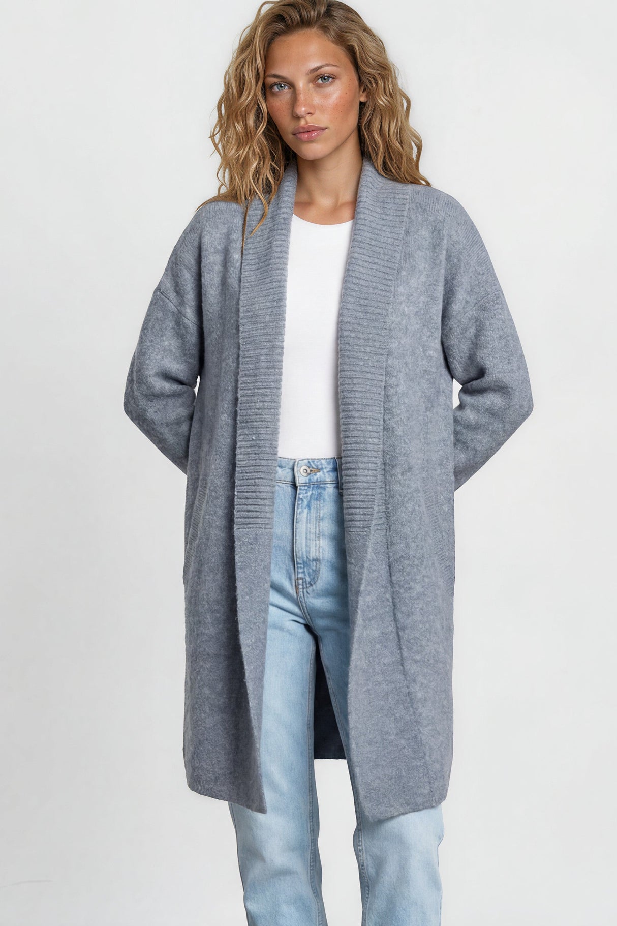 Model wearing Oswin Cardigan in Blue from Salty Crush