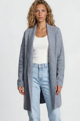 Model wearing Oswin Cardigan in Blue from Salty Crush