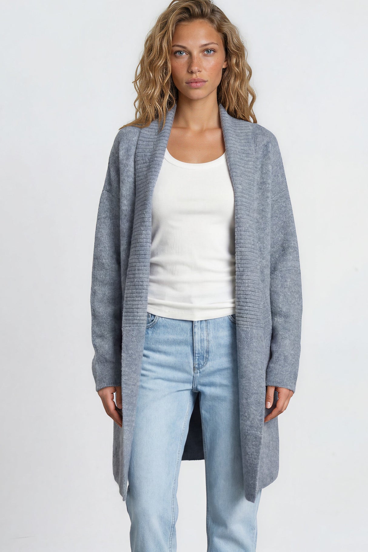 Model wearing Oswin Cardigan in Blue from Salty Crush