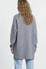 Model wearing Oswin Cardigan in Blue from Salty Crush