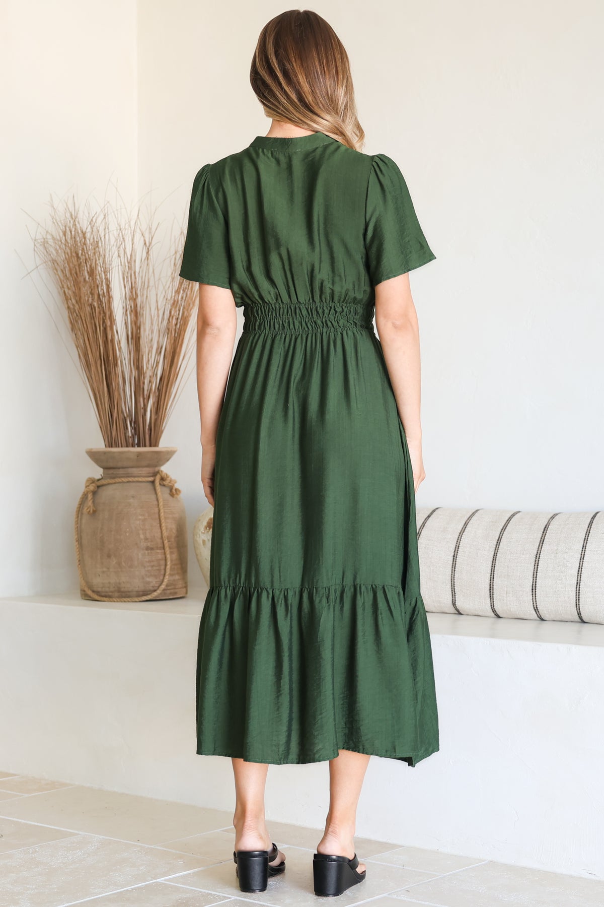 Model wearing Paloma Midi Dress in Emerald from Salty Crush