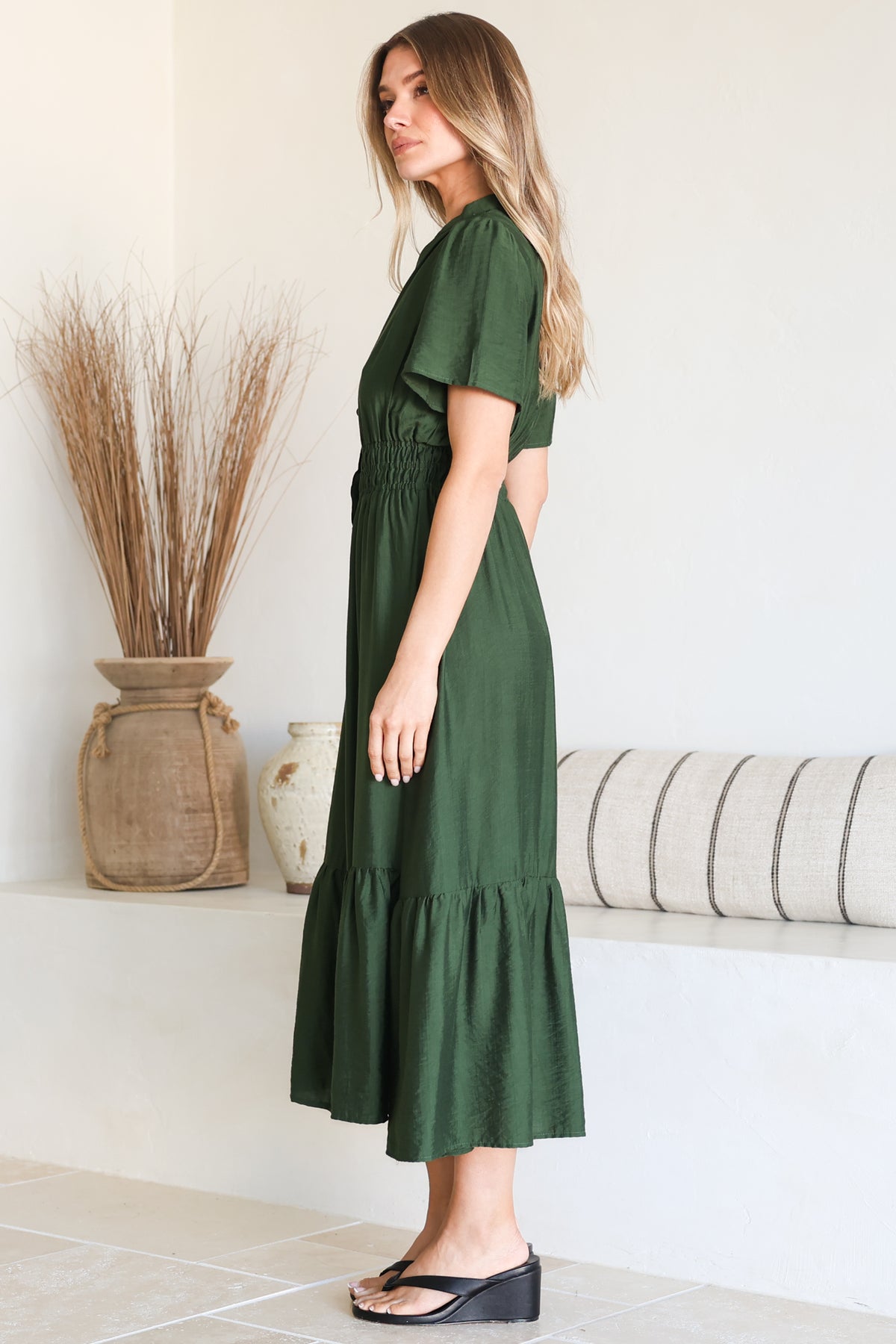 Model wearing Paloma Midi Dress in Emerald from Salty Crush