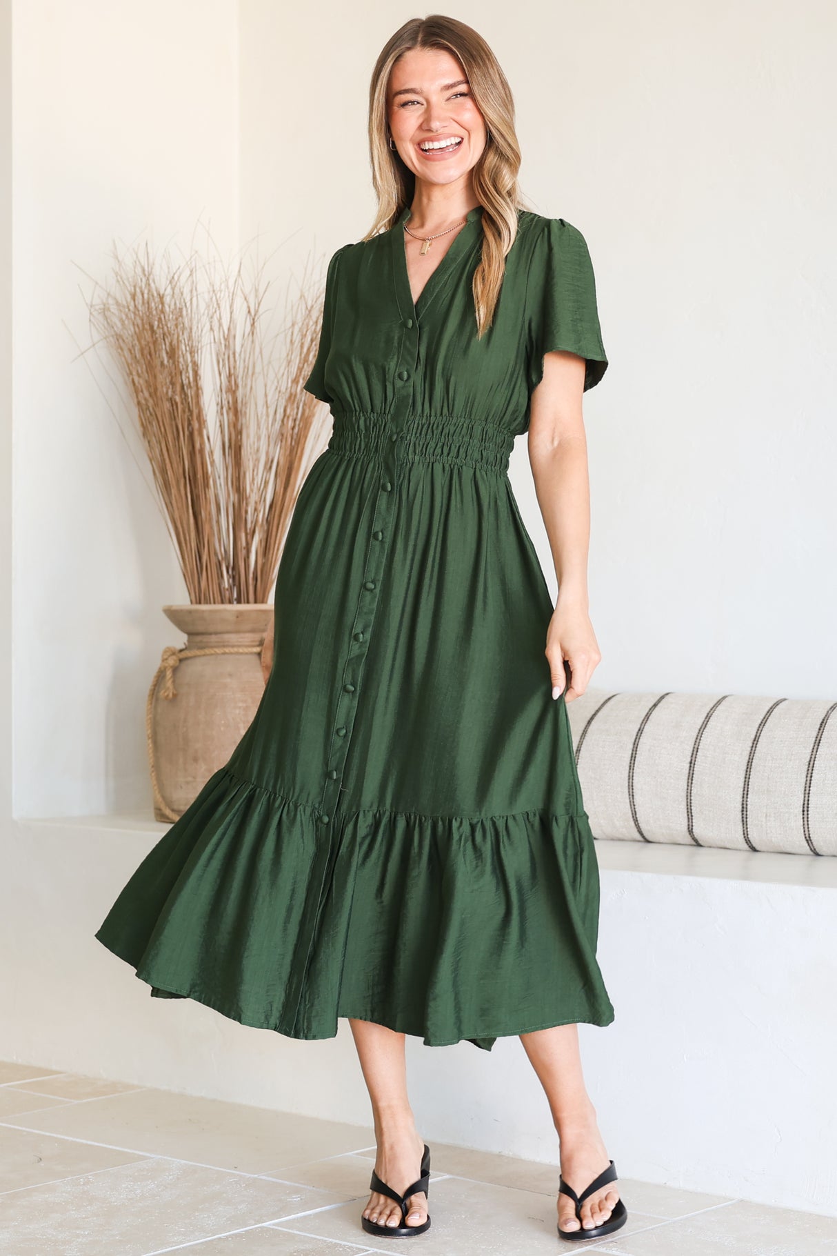 Model wearing Paloma Midi Dress in Emerald from Salty Crush