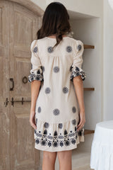 Patty Mini Dress - V-Neck Embroidered Babydoll Dress with 3/4 Sleeves in Solsana Print in Black