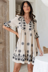 Patty Mini Dress - V-Neck Embroidered Babydoll Dress with 3/4 Sleeves in Solsana Print in Black