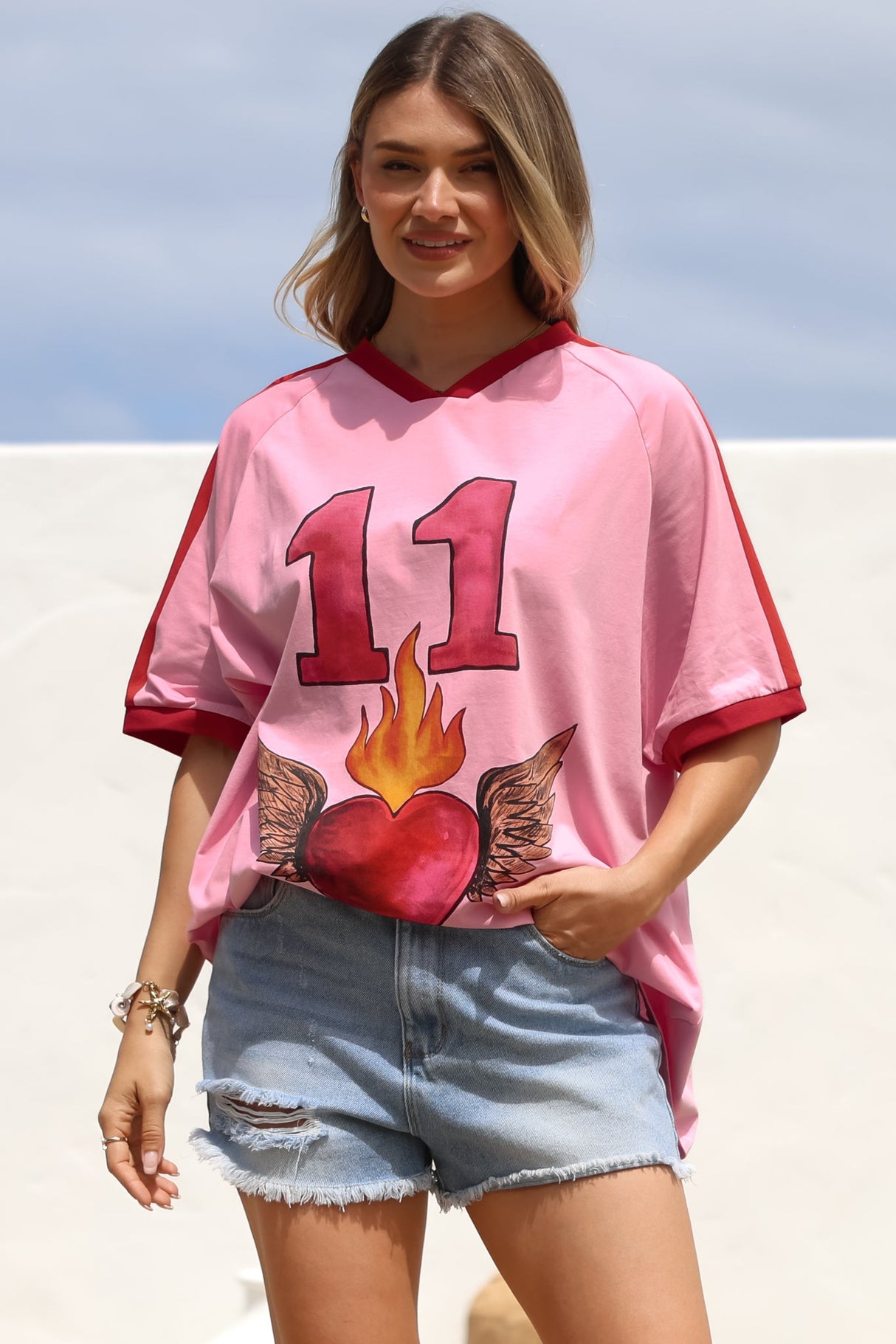 Pink 11 Tee - Graphic Print Short Sleeve T-Shirt with Racer Stripe Sleeves in Pink