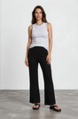 Model wearing Ravio Knit Pants in Black from Salty Crush