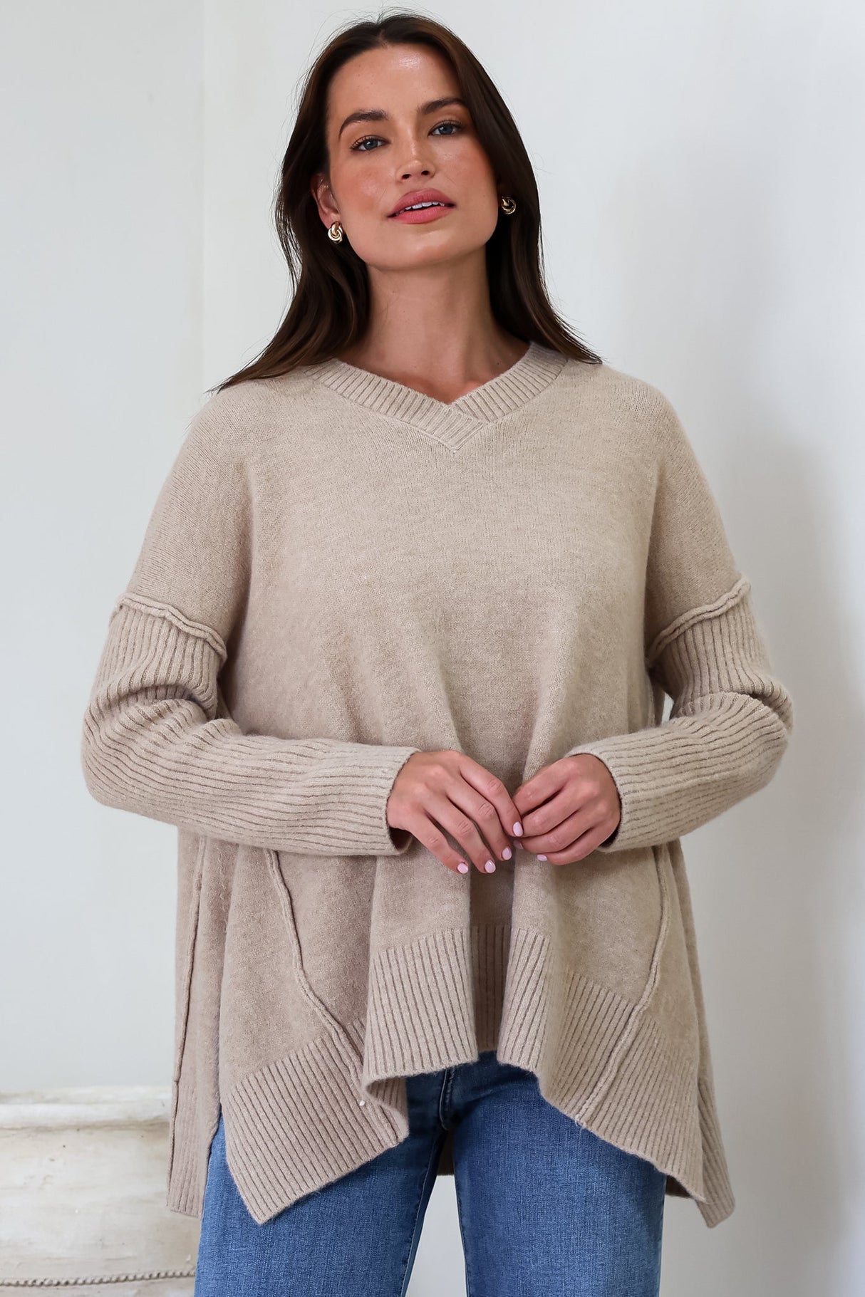 Ridge Jumper - V Neck Relaxed Shark Bite Ribbed Hemline Knit in Beige