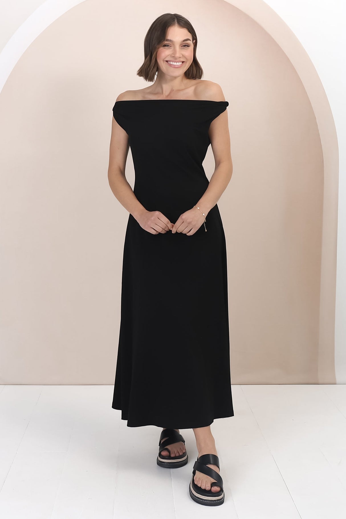 Rosalia Maxi Dress - Asymmetric Neckline Twist Sleeve A-Line Dress in Black