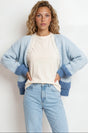 Model wearing Rosie Cardigan in  Baby Blue from Salty Crush
