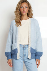 Model wearing Rosie Cardigan in  Baby Blue from Salty Crush
