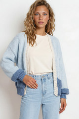 Model wearing Rosie Cardigan in  Baby Blue from Salty Crush