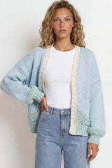 Model wearing Rosie Cardigan in  Blue/Green from Salty Crush