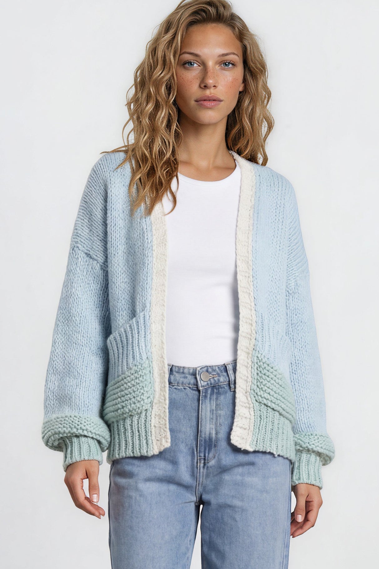 Model wearing Rosie Cardigan in  Blue/Green from Salty Crush
