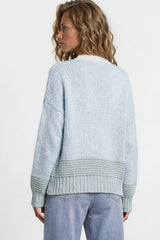 Model wearing Rosie Cardigan in  Blue/Green from Salty Crush