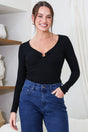 Model wearing Roxana Top in Black from Salty Crush