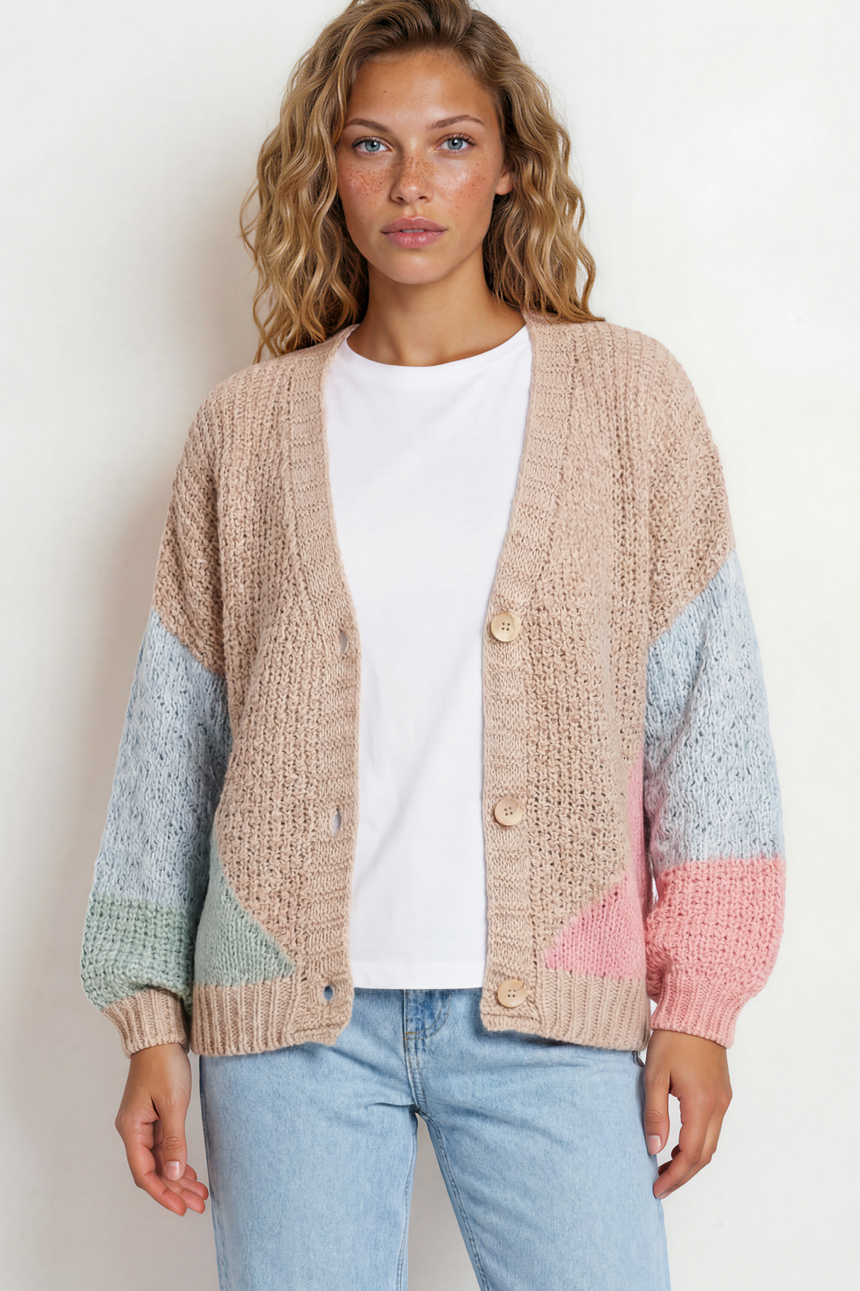 Model wearing Rubina Cardigan in Beige/Pink from Salty Crush
