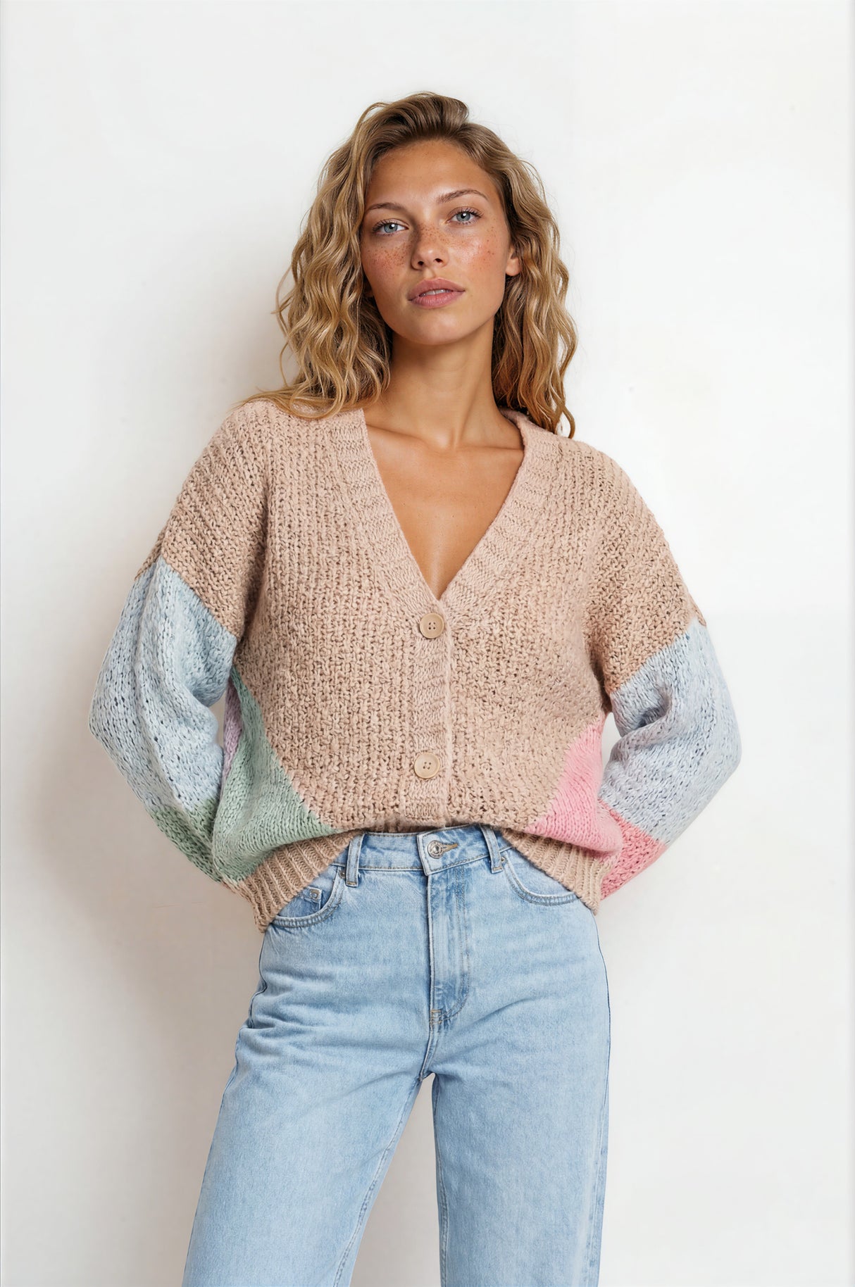 Model wearing Rubina Cardigan in Beige/Pink from Salty Crush

