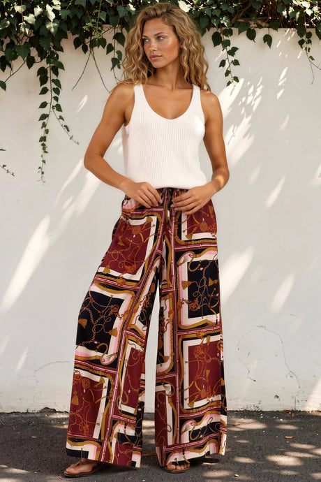 Model wearing Rune Pants in Celia Print from Salty Crush