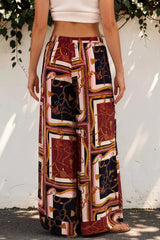 Model wearing Rune Pants in Celia Print from Salty Crush