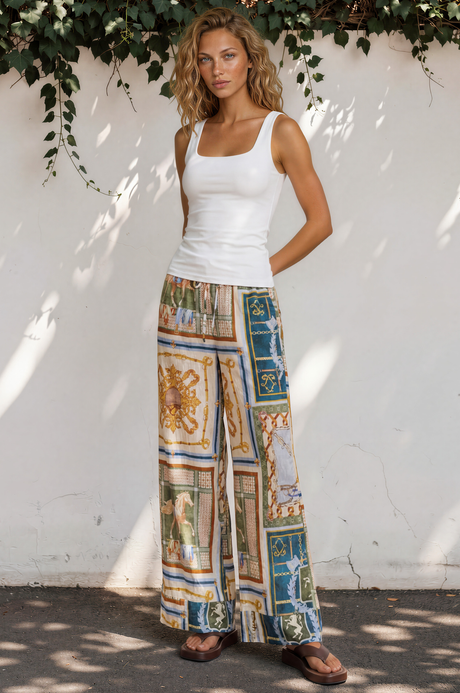 Model wearing Rune Pants in Regalia Print from Salty Crush