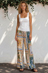 Model wearing Rune Pants in Regalia Print from Salty Crush
