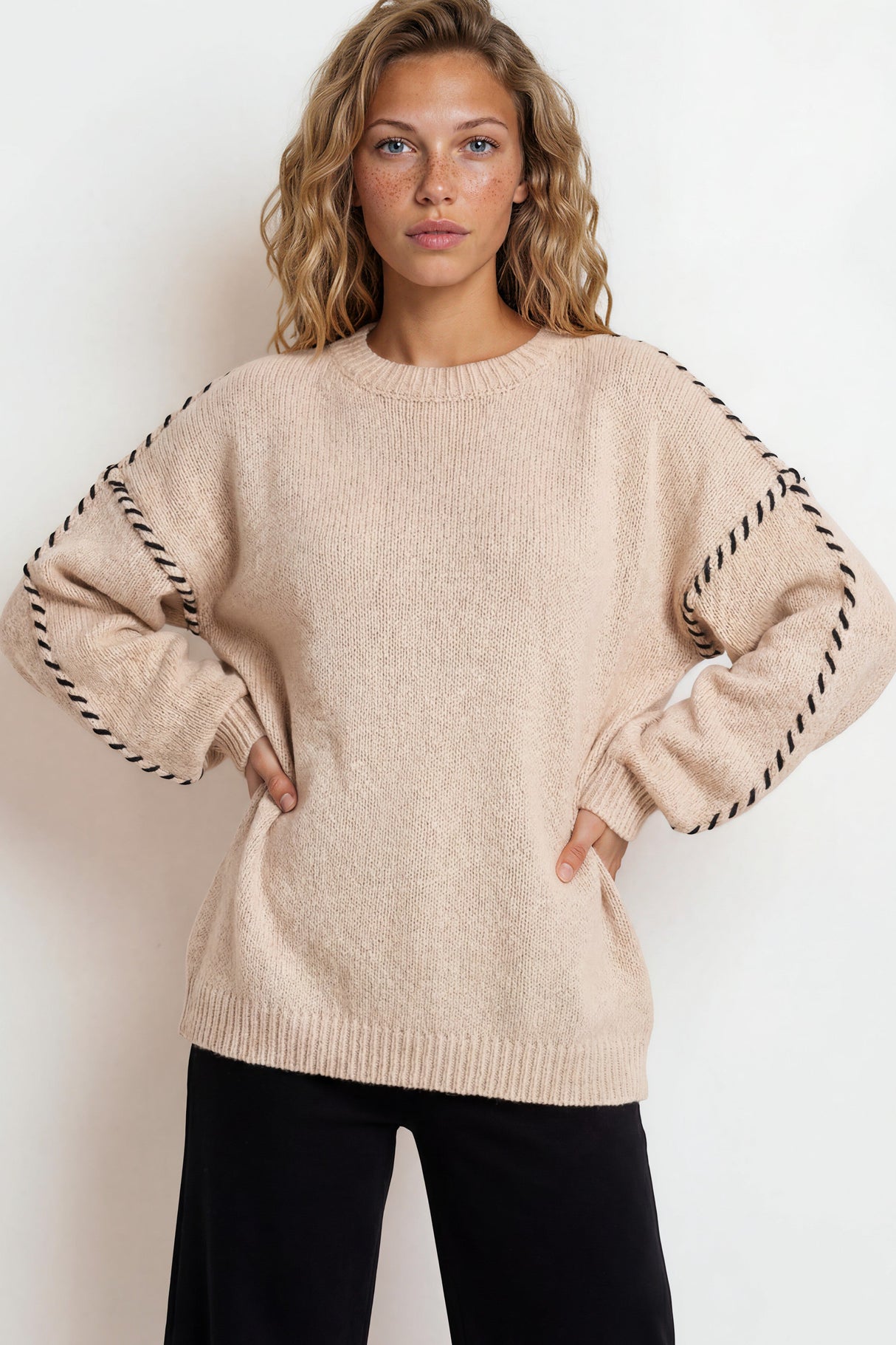 Model wearing Saige Jumper in Beige from Salty Crush
