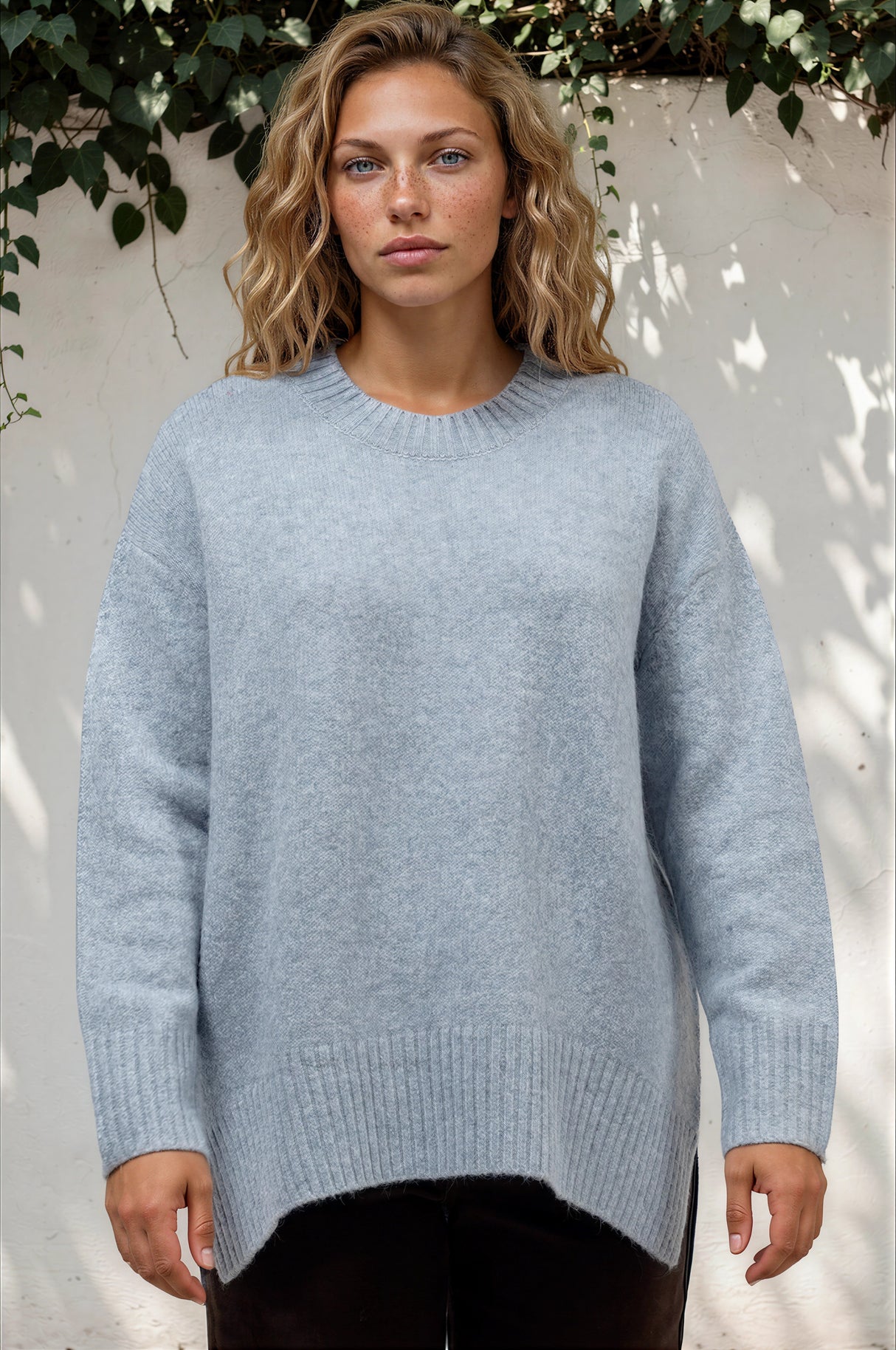 Model wearing Sandro Jumper in Blue from Salty Crush