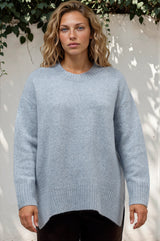 Model wearing Sandro Jumper in Blue from Salty Crush