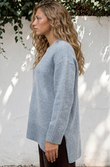 Model wearing Sandro Jumper in Blue from Salty Crush