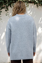 Model wearing Sandro Jumper in Blue from Salty Crush