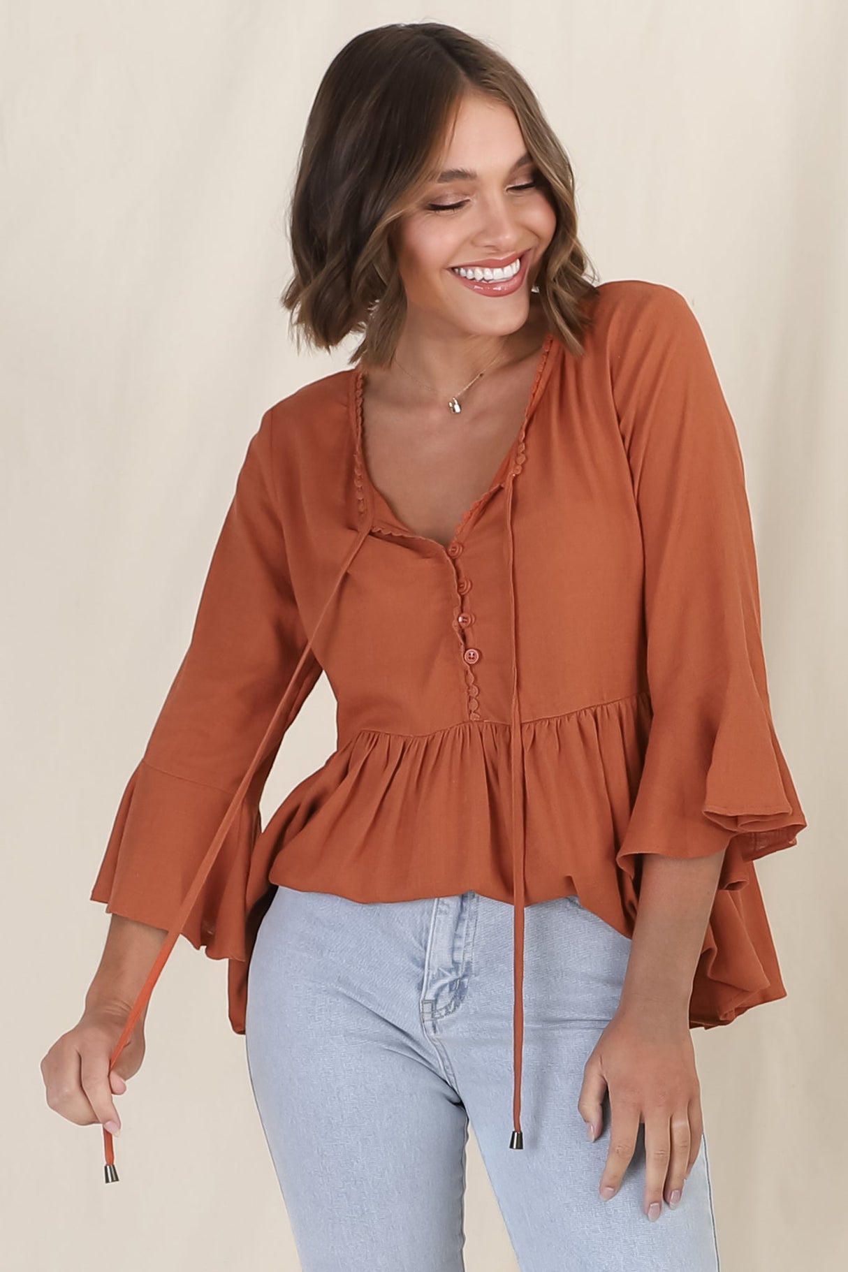 Sandy Top - Crochet Neckline Buttoned Bodice Flare Sleeve Smock Top in Tan